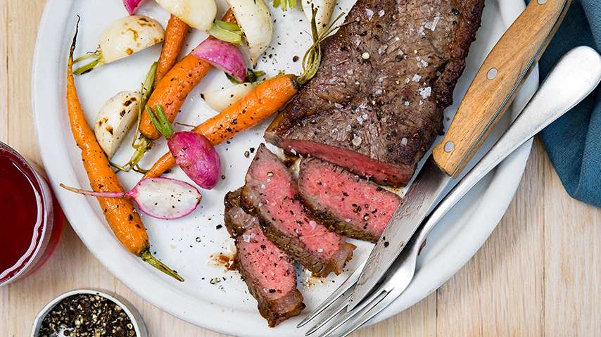 Beautifully seared medium sirloin with seared carrot, raddish, and parsnip